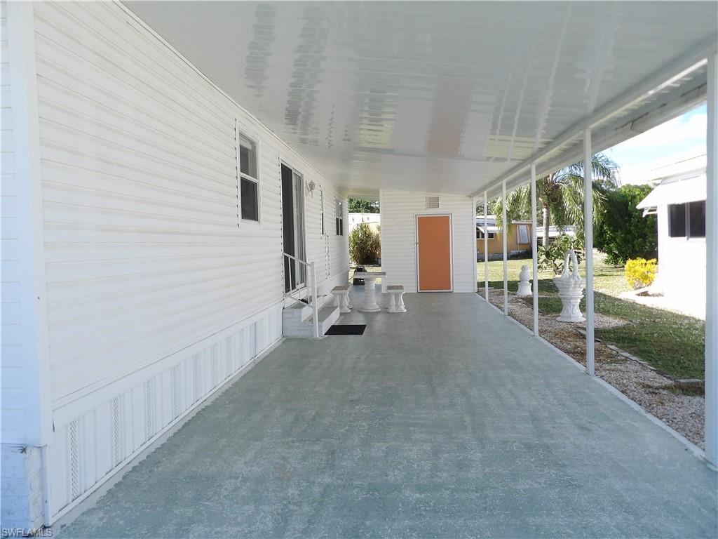 Image 2: View of Patio and Driveway