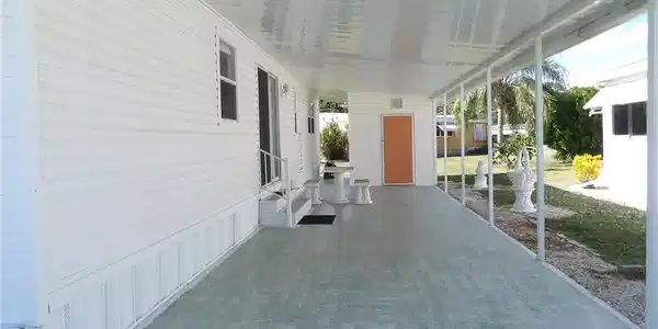 Image 2: View of Patio and Driveway