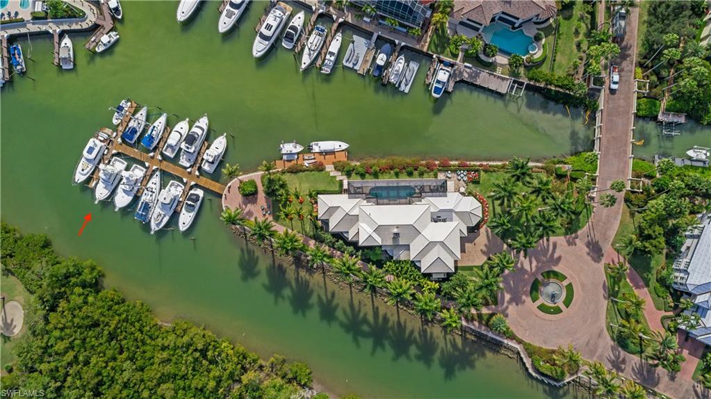 Image 3: Aerial overview of property's location with a nearby body of water