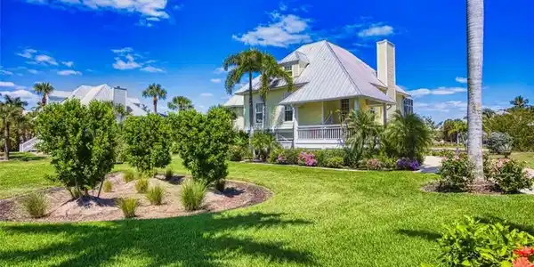 Image 2: ront Exterior with Beautiful Landscaping
