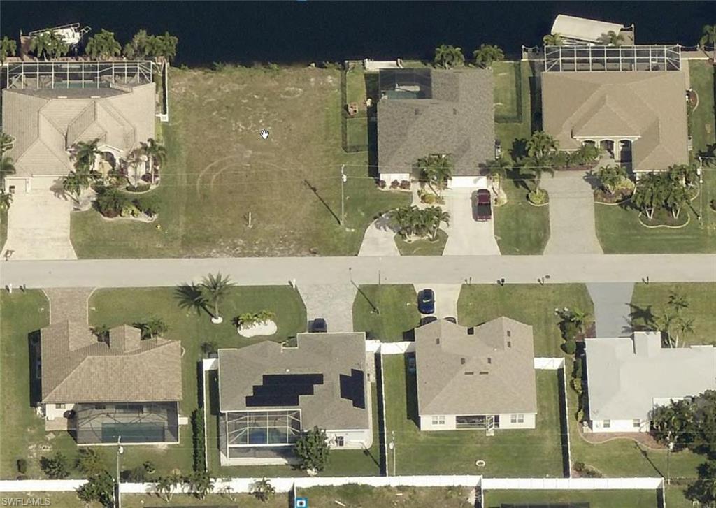 Image 4: Aerial overview of property's location featuring nearby suburban area
