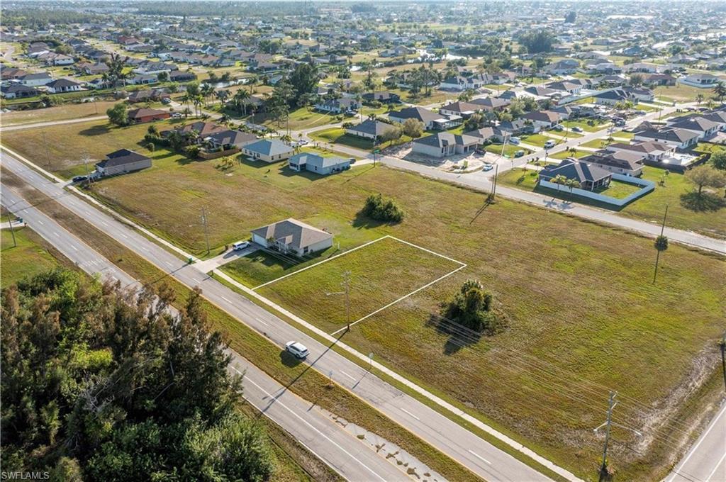 Image 4: Drone / aerial view with a residential view