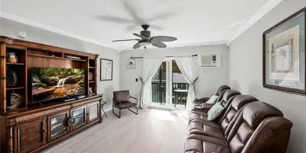 Image 2: Open main living area with tile floors