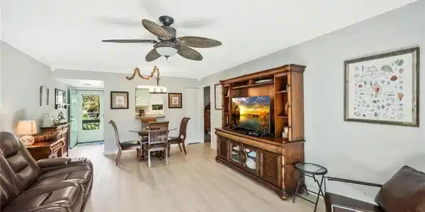 Image 3: Open main living area with tile floors