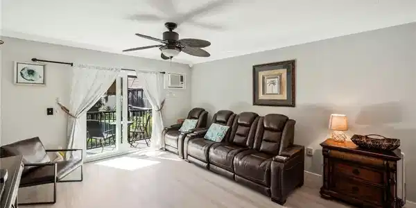 Image 4: Open main living area with tile floors