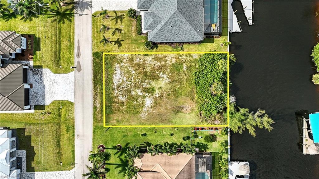 Image 4: Aerial view of property's location with property parcel outlined