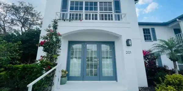 Image 2: Doorway to property featuring french doors and stucco siding