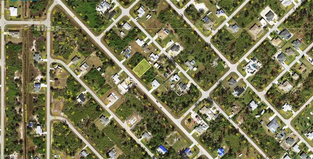 Image 2: Aerial Survey. Depicting the property within its surrounding area and displaying parcel boundaries