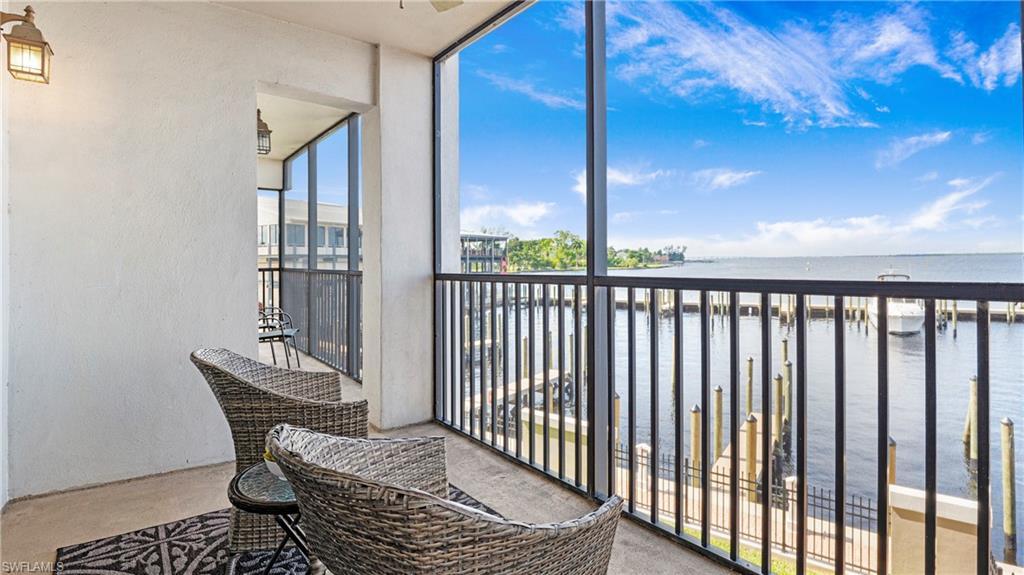 Image 3: Balcony with a water view and a sunroom