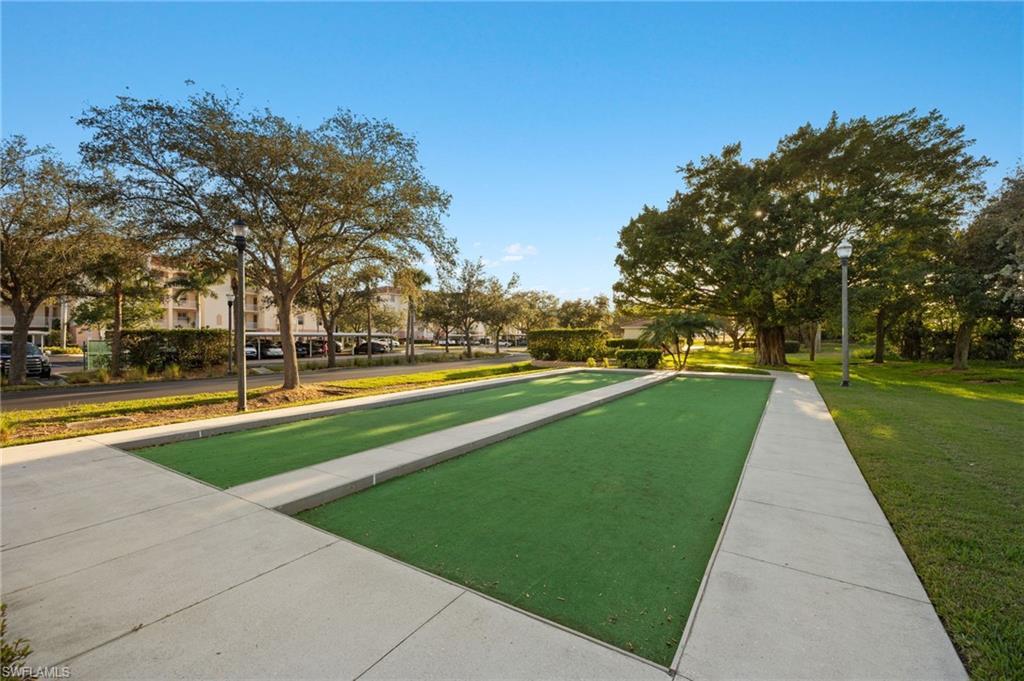 Image 4: View of community featuring a bocce ball area