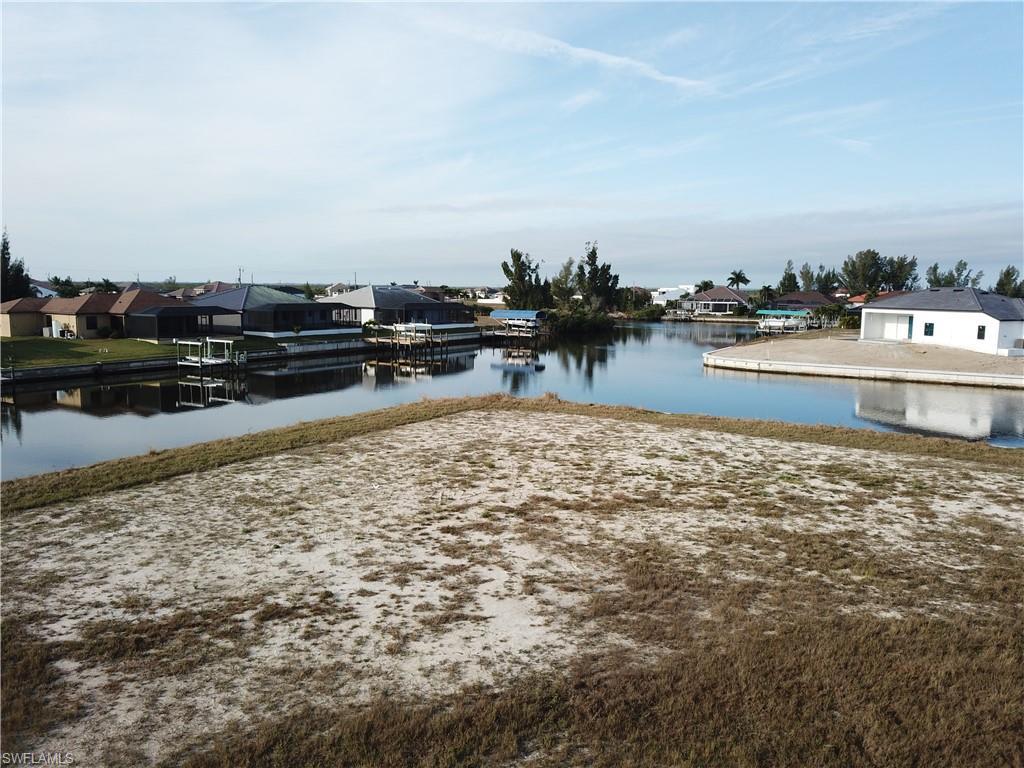 Image 1: Water view with nearby suburban area
