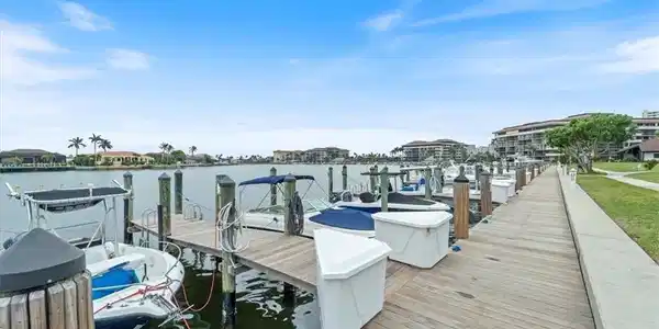 Image 3: Dock featuring a water view