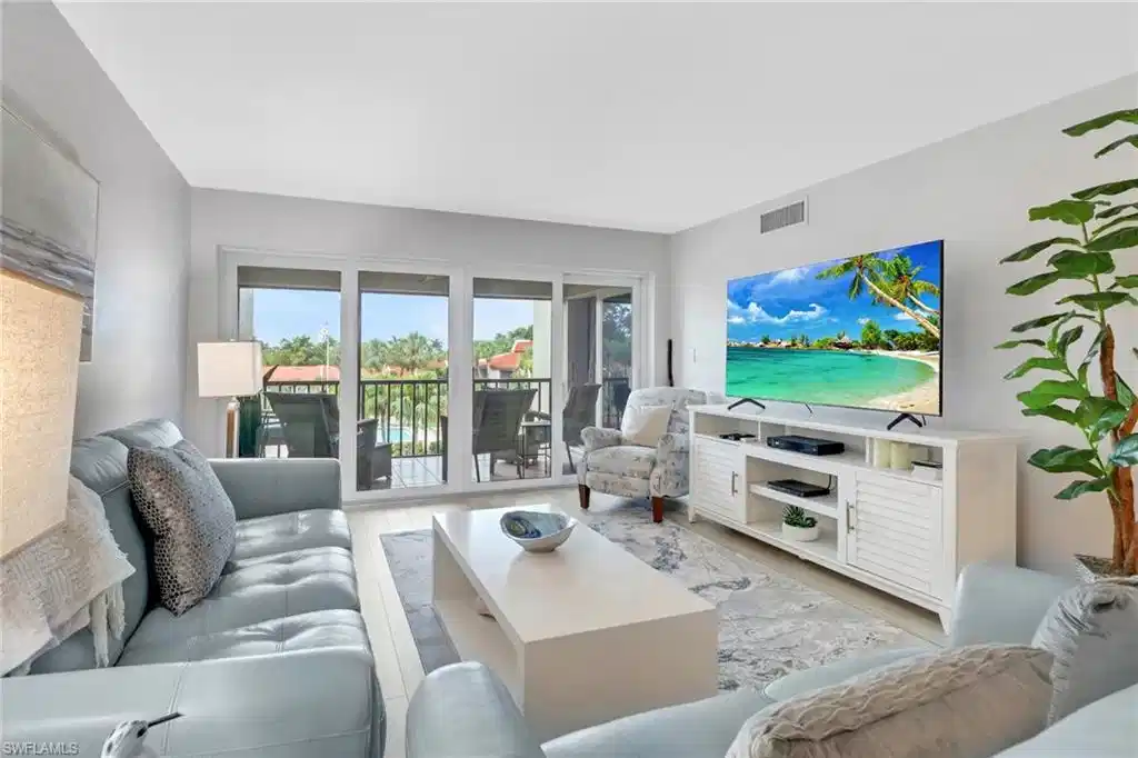 Image 1: Living room featuring wood finished floors