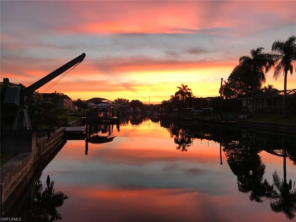 Image 3: Water view featuring a dock