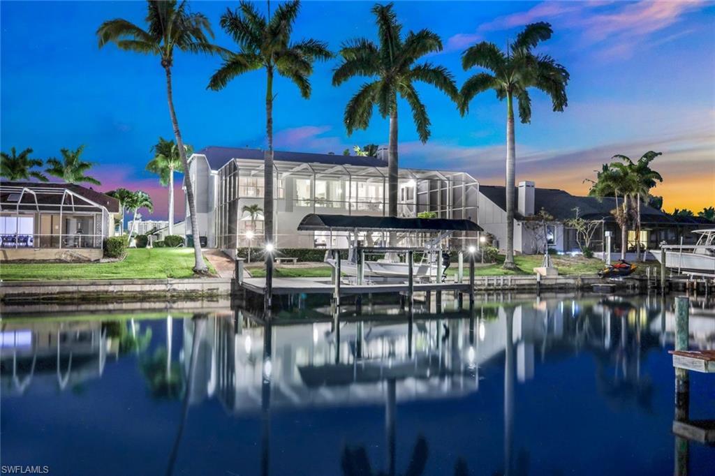 Image 2: Wrap around boat dock with boat lift and room for expansion.