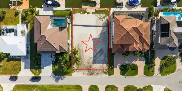 Image 3: Drone footage directly above the property.