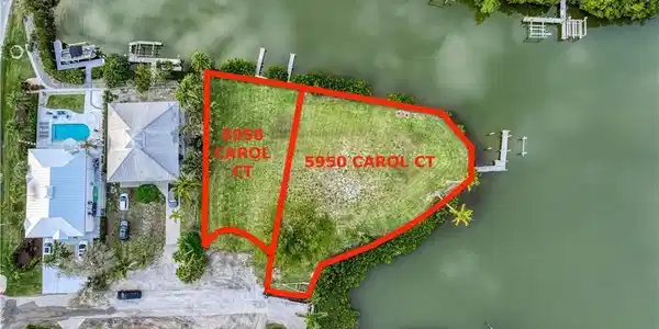Image 3: View of property location with property parcel outlined and a large body of water