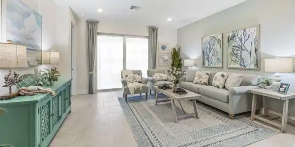 Image 2: Recessed lighting, light-toned tile flooring, and a large sliding glass door
