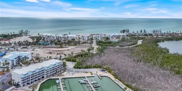 Image 4: Drone / aerial view with a water view