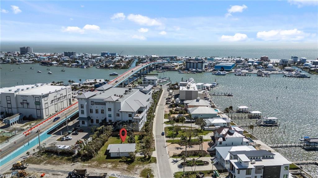 Image 1: View of urban area with a large body of water