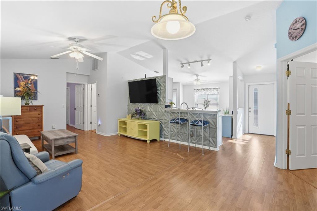 Image 4: Open living, kitchen & dining area