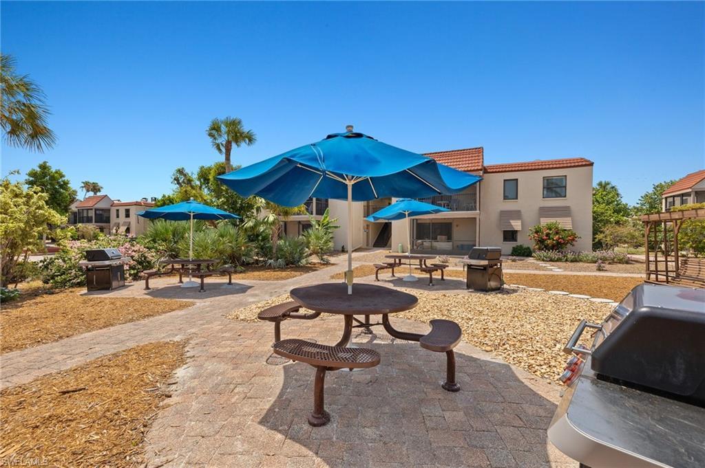 Image 2: View of community featuring a patio area