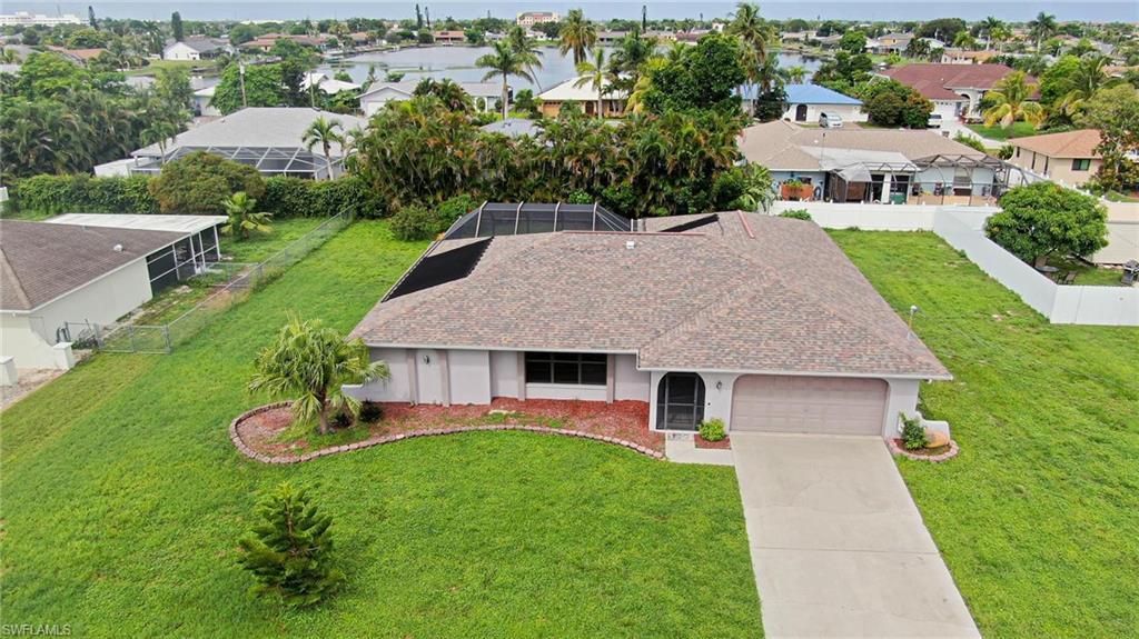 Image 1: This over sized lot provides lots of space for this contemporary POOL home!
