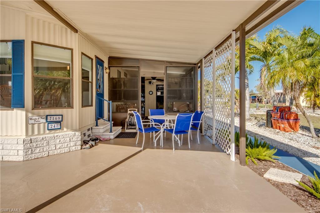 Image 3: View of patio with outdoor dining area