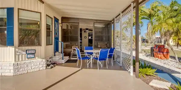 Image 3: View of patio with outdoor dining area