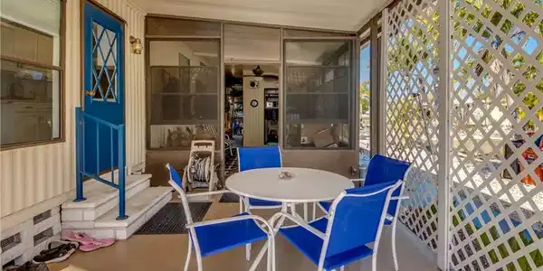 Image 4: Sunroom with outdoor  patio, and entry steps
