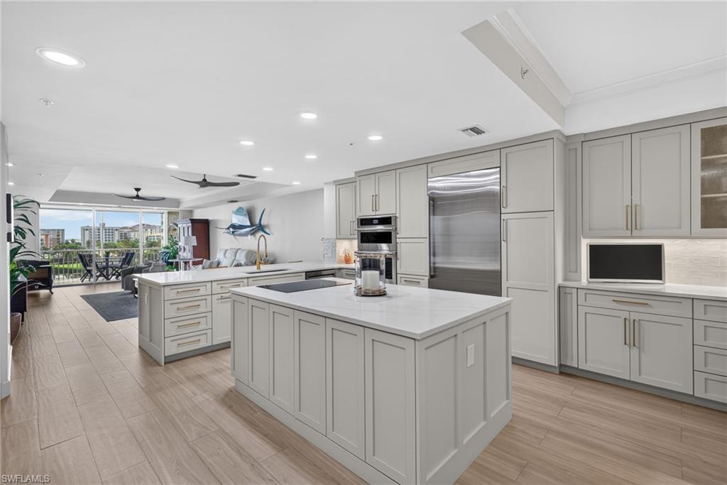 Image 2: Beautifully upgraded kitched,with newer appliances, open floor plan to enjoy water views