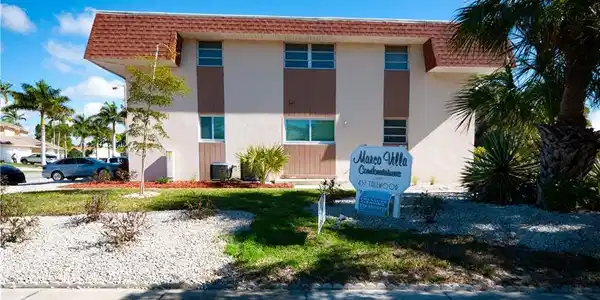 Image 3: Exterior of building, right top floor corner unit.