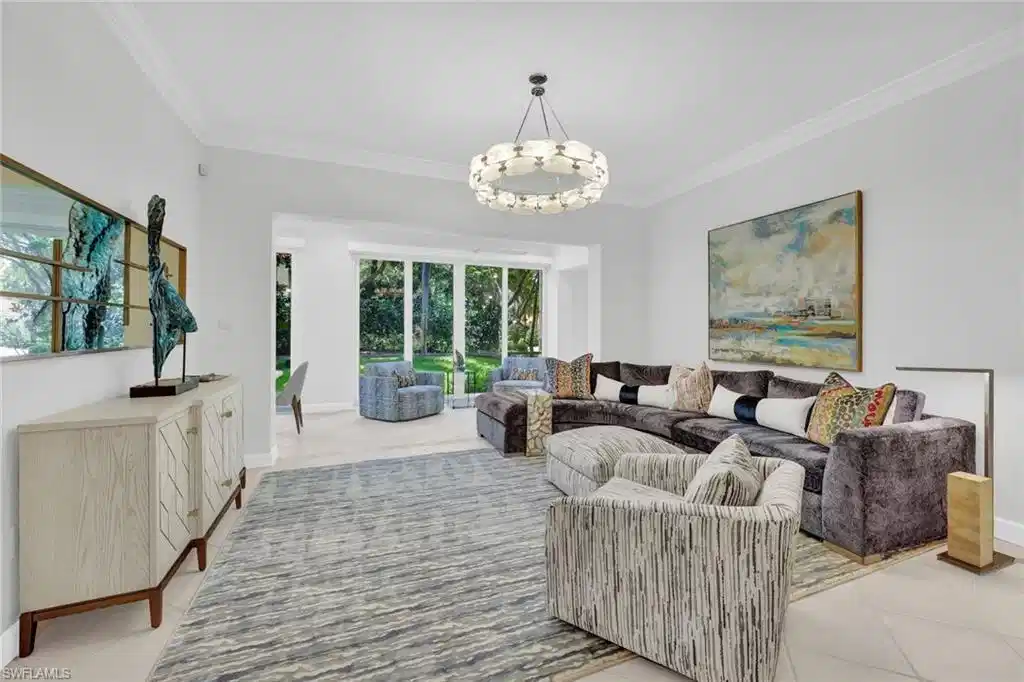 Image 1: Beautifully reimagined first floor home in the coveted neighborhood of The Hamptons at Bonita Bay.