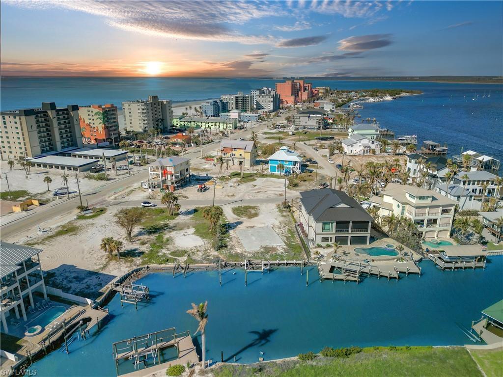 Image 1: View of urban area with a nearby body of water