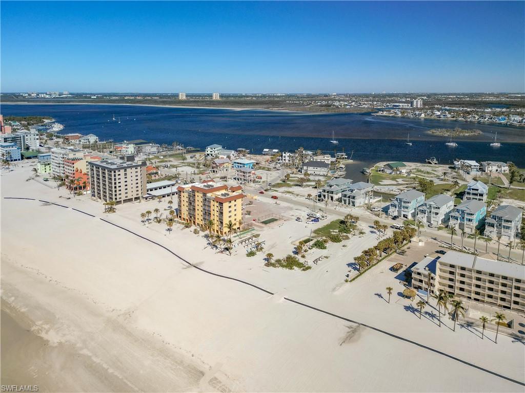 Image 4: View of urban area featuring a nearby body of water