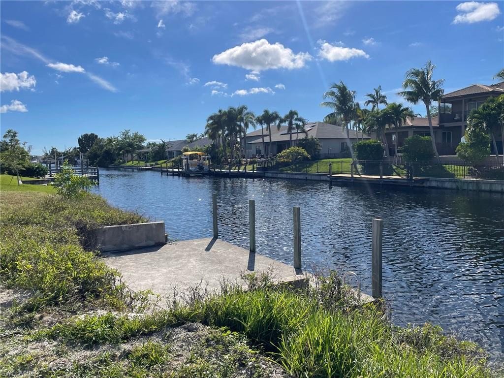 Image 1: Water view with a boat dock