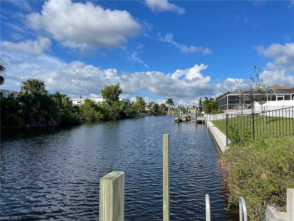 Image 4: Dock area featuring a water view