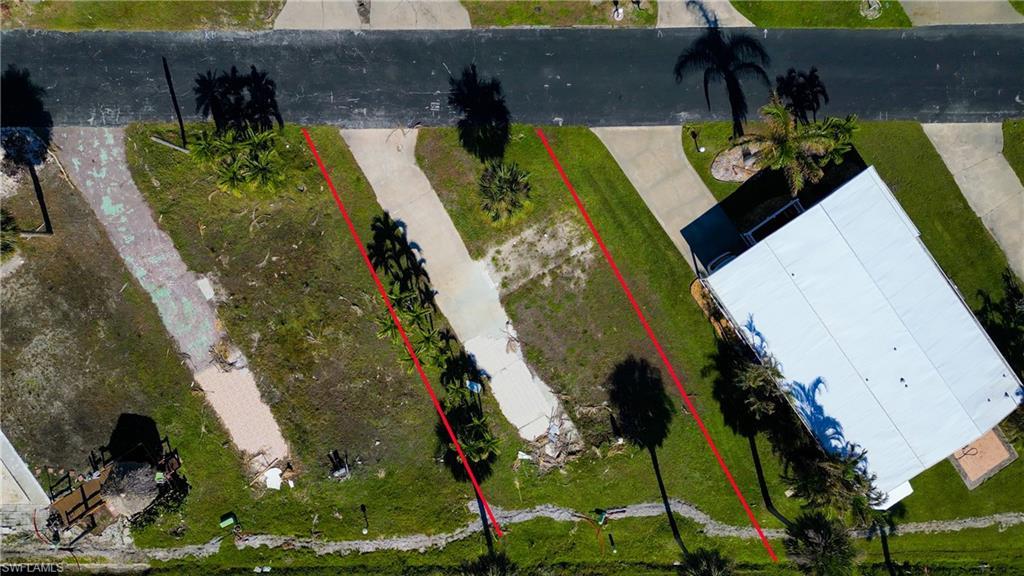 Image 1: Aerial view of property's location with property boundaries highlighted