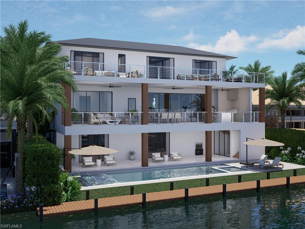 Image 3: Rear view of property featuring ceiling fan, a balcony, a water view, and a patio