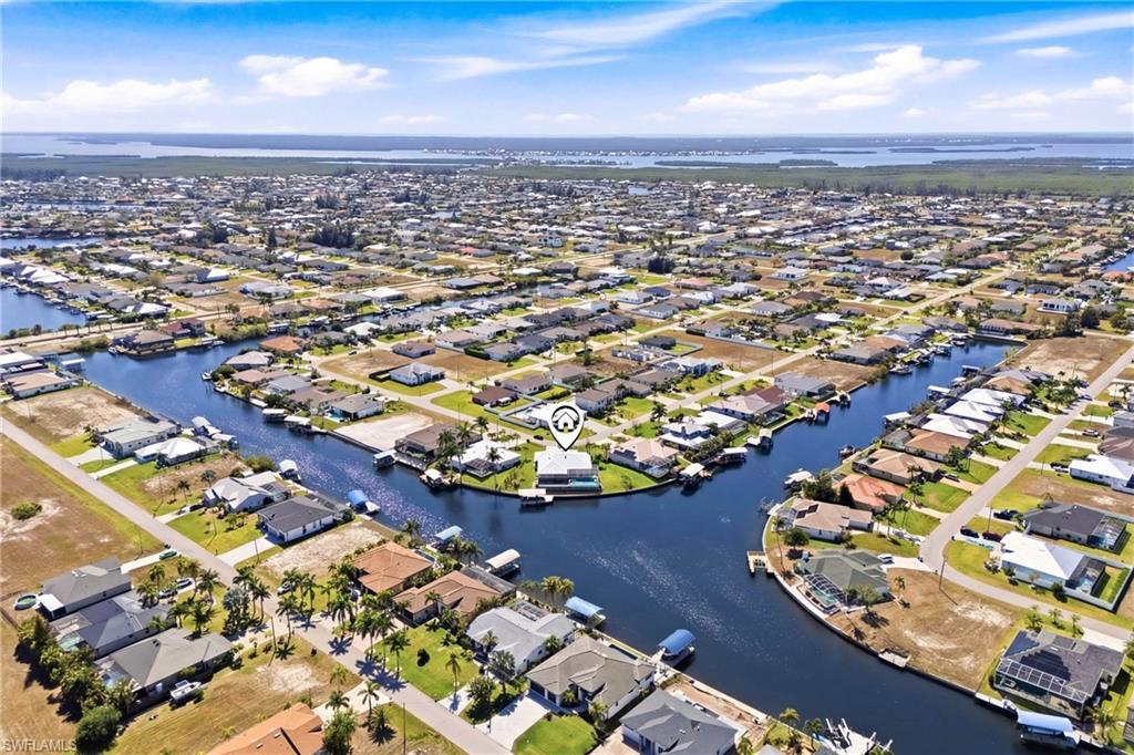 Image 3: Breathtaking aerial perspective showcasing expansive intersecting canal views and direct Gulf-access boating.
