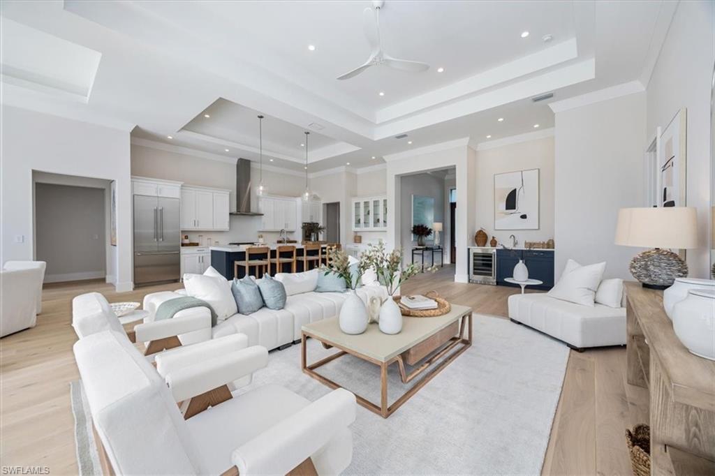 Image 3: 4554 Seagrove Landing Way is a pre-construction customized Dune plan purchase agreement. The photos in this listing are of a recently constructed and staged Dune plan with similar materials and features in the same community. This plan may be built as shown or customized.