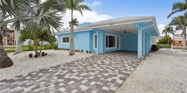 Image 3: Back of property featuring a patio and ceiling fan