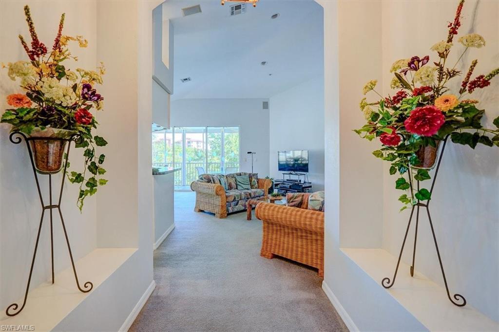 Image 4: Hall with carpet floors and baseboards