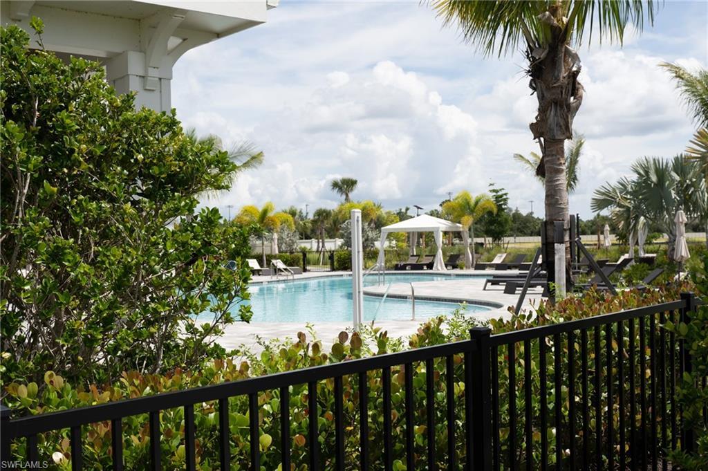 Image 4: View of pool with a gazebo and a patio area