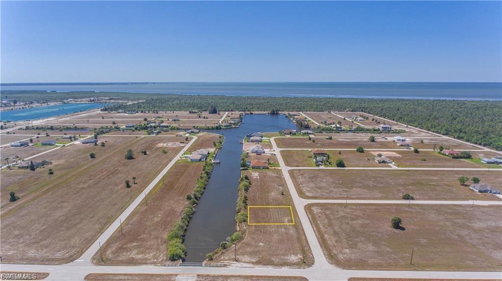 Image 1: Bird's eye view of a nearby body of water