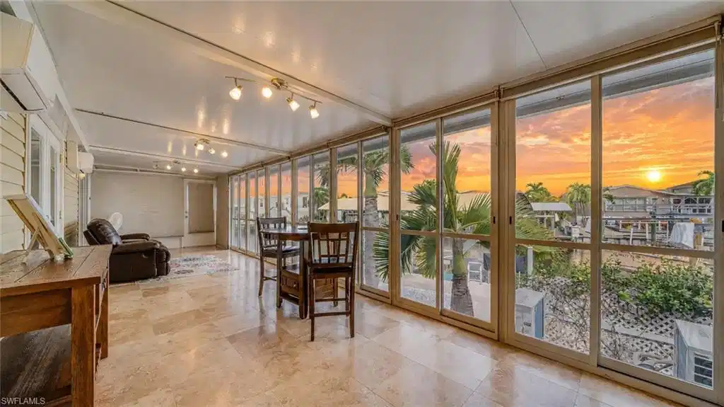 Image 1: Enclosed Florida Room to Enjoy Water Views and Sunets