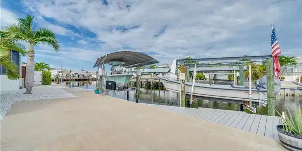 Image 3: Two Boat Lifts and 107' of Newer Seawall