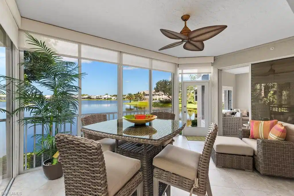 Image 1: Lake view from enclosed lanai