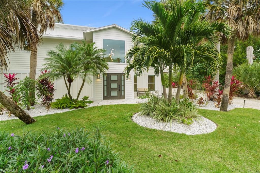 Image 2: View of front of house featuring a front yard