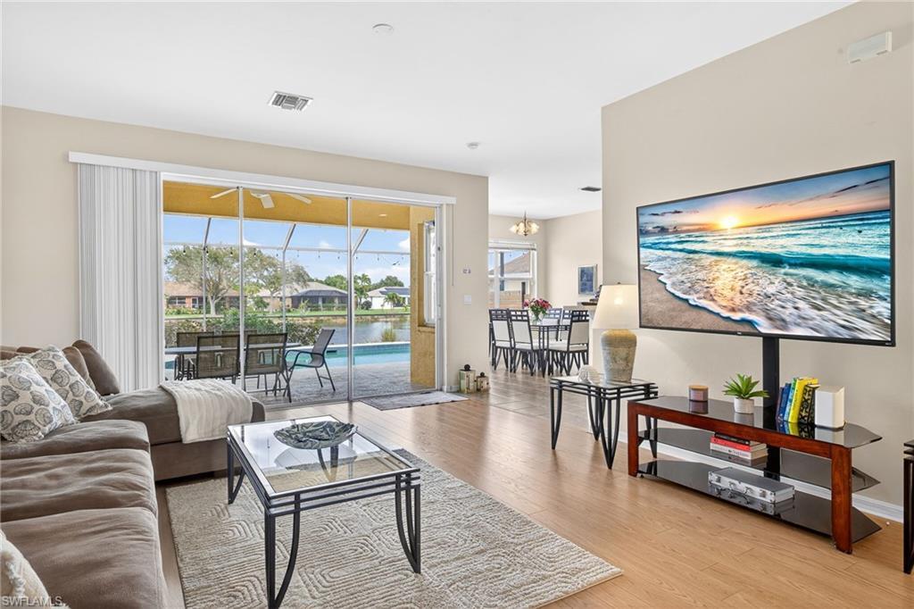 Image 3: LIGHT AND BRIGHT! 3 WIDE SLIDERS BRING THE OUTSIDE IN!